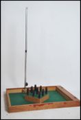 A boxed vintage 20th century bar skittles game com