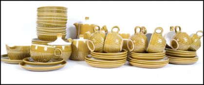 A retro stone ware style service by Langley consis