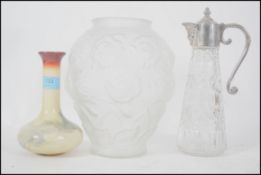 A 20th century faceted cut glass and silver plated claret jug together with a studio art glass