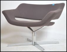 A Hitch Mylius HM85 chair, raised on a quadruped s