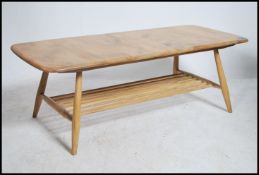 An Ercol light elm coffee table, rectangular form