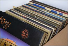 A collection of vinyl long play / LP records dating from the 1980's to include Midnight Oil,