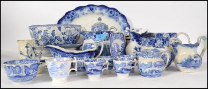 A large collection of blue and white ceramics to include examples by Copeland Spode, Doulton,
