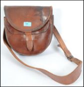 A vintage 5 pocket strong leather cash collection bag, typically for a milk man or trader having a