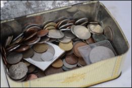 A collection of assorted vintage and antique coins, mostly 20th century, some older.