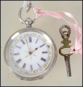 A continental silver and enamel open faced ladies