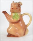 An unusual retro Tony Wood Staffordshire England ceramic teapot in the form of a rabbit being