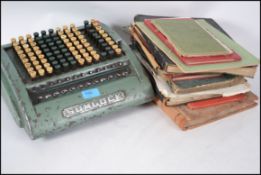A collection of items to include a Sumlock Comptometer from Godwin and Warren Co together with