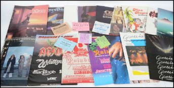 A collection of music posters and programmes dating from the 1980's to include Ozzy Osborne,
