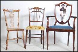 A set of 3 bedroom chairs to include a 19th century hepplewhite carver, country oak bedroom chair,