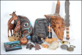 A collection of tourist items from all around the world to include Africa, Egypt, Norway, Japan,