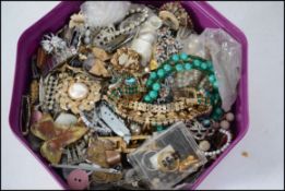 A box of assorted costume jewellery to include necklaces, bangles and other items