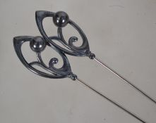 A pair of Charles Horner high Art Nouveau stick -