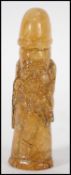 A Chinese Amber? Carved figure of an elder in the form of a phallic.