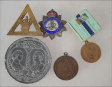 A small collection of commemorative coins / medals to include HRH Princess Louise Married To The