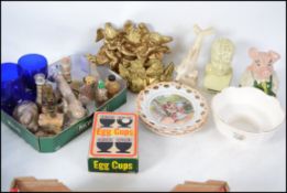 A mixed lot t include a group of Isle of Wight sand sculptures, Bristol blue glass, Phrenology