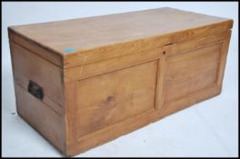 An early 20th century oak blanket box chest. Cast