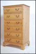 A 20th century straight six pine chest of drawers,