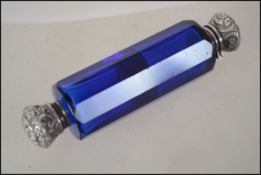 A Victorian blue glass and silver double ended per