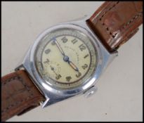 A vintage 20th century believed services wristwatch by Revue Sport having decorative Art Deco face