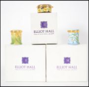 A collection of three Elliot Hall limited edition enamel trinket boxes.  These three floral themed