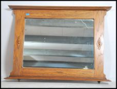 A large Victorian Arts & Crafts golden oak wall ov