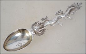A Chinese silver hallmarked teaspoon in the form o