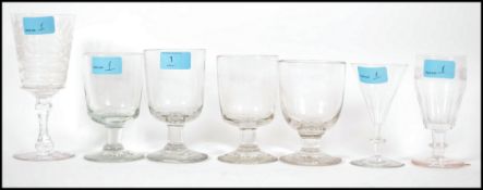 A group of four good Edwardian wine claret glasses