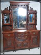 A large Victorian mahogany mirror back sideboard.