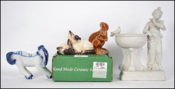 A Royal Doulton figurine of Siamese cats model no