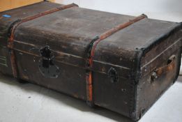 A vintage cased Steamer trunk being canvas and woo