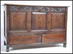 An 18th century country oak mule chest coffer rais