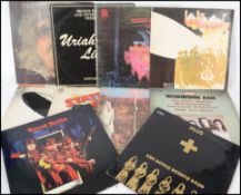 A good collection of ten vinyl long play records to include Uriah Heep, Led Zeppelin, Black Sabbath,
