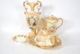 A boxed Royal Doulton place matts and coaters set in the ' Sensuality ' pattern.