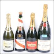 Four bottles of champagne to include Moet Chandon