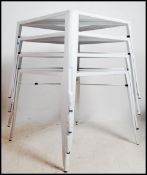 An unusual set of 4 painted metal modernist stacki