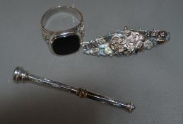 A hallmarked silver and gold sweetheart brooch with bird and foliate embellishment 