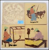 A group of five vintage tiles.  One being of Minto