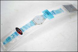 A collectable unused boxed James Bond 007 Thunder ball Skin Swatch Watch. Complete in case with