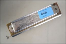 Musical Instruments A good quality 20th century Hohner Harmonica ' The Super Chromonica '