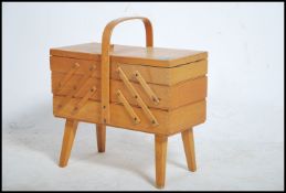 A 1950's retro beech - blond wood metamorphic sewi
