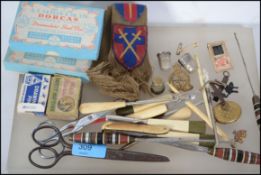 A collection of items to include button hooks, sil