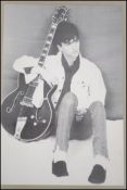 A collectable promotional poster for Johnny Marr of The Smiths together with a matching Rough