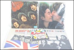 A collection of 4x vintage Beatles LP's - Pantomime (cover AF), Rubber Soul, London Town and The