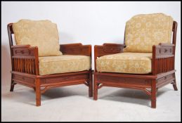 A pair of 20th century Chinese influenced armchair