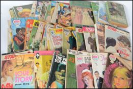 A collection of Love Story Picture Library magazines and romance novels, some by Pan Books and