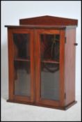 A good Victorian solid mahogany hanging cabinet -