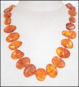 An early 20th century graduating beaded amber necklace.