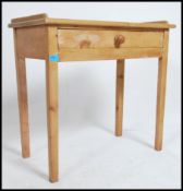 A Victorian country pine writing table desk of sma