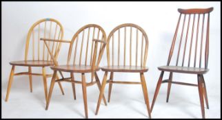A collecton of 4 Ercol mid century dining chairs t